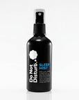 Black spray bottle labeled 'Do Not Disturb Sleep Mist' on a white background